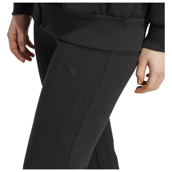 Adidas Γυναικείο παντελόνι φόρμας All SZN Soft Lux Flared Pants